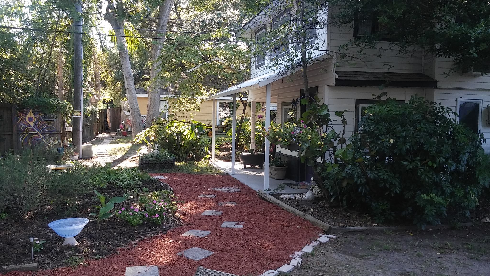 AI Generated image of Sunset House and Gardens Hostel.